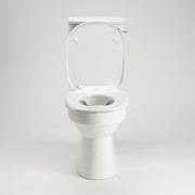 AKW white ergonomic toilet seat with lid shown lid up fitted to a toilet pan