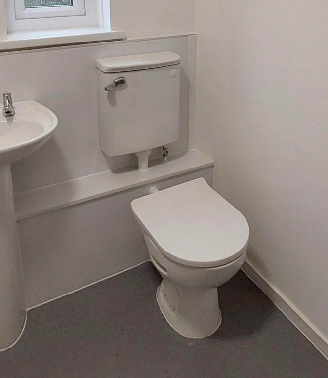AKW standard height low level WC suite with push button flush (23174PB) in white vitreous china