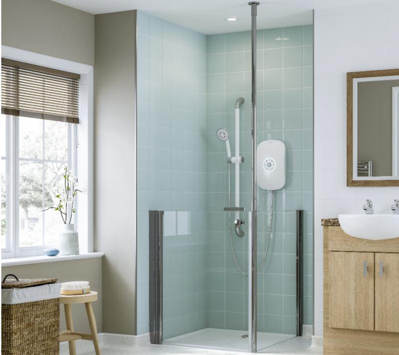 AKW Larenco Care half height corner glass shower enclosure installed in a bathroom with electric shower