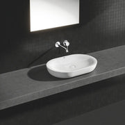 Grohe Essence wall-mounted 2-hole basin mixer M-Size StarLight Chrome spout detail