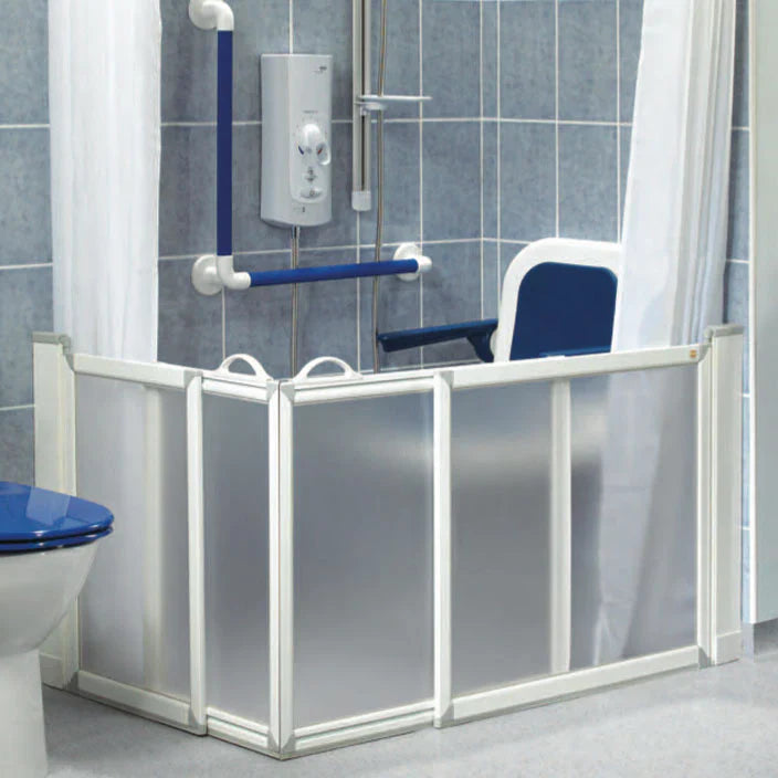 Accessible wet room with AKW half height shower screen fitted to a wet floor