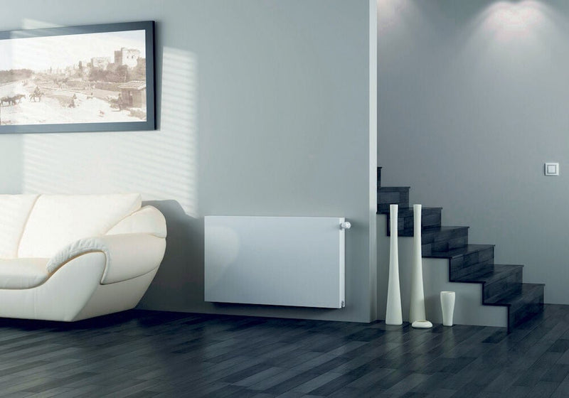 Kartell K-Flat Kompact Type 22 flat panel horizontal radiator in white gloss in a living room