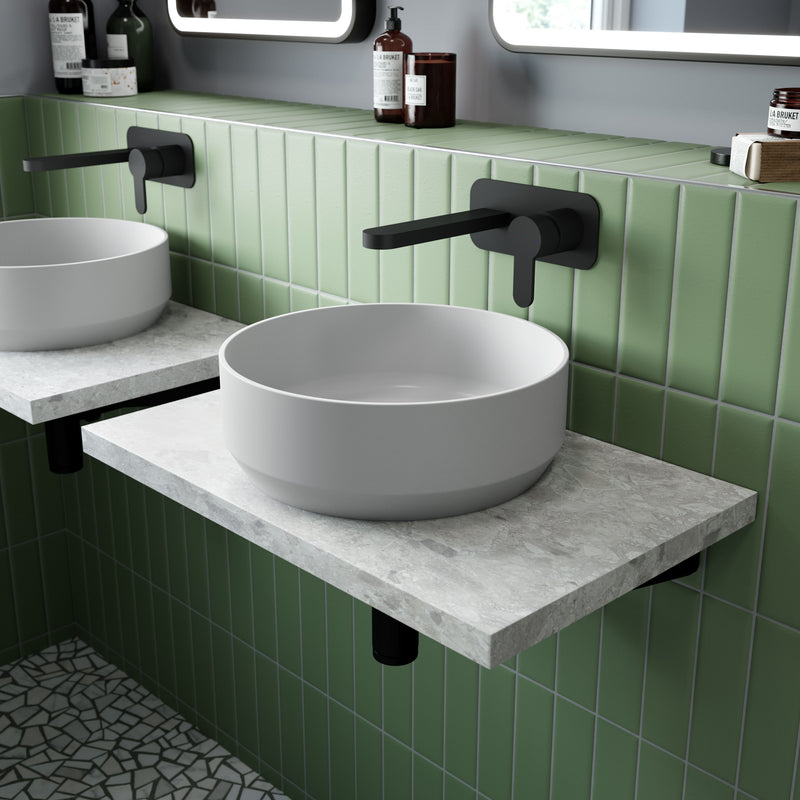 Nuie Revolution Matt Black Wall Mounted Basin Mixer lifestyle image 1