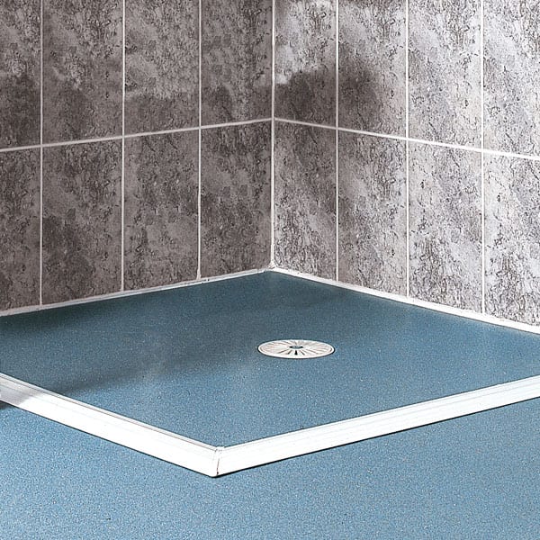 AKW aluminium wet room threshold kit fitted to a wet floor