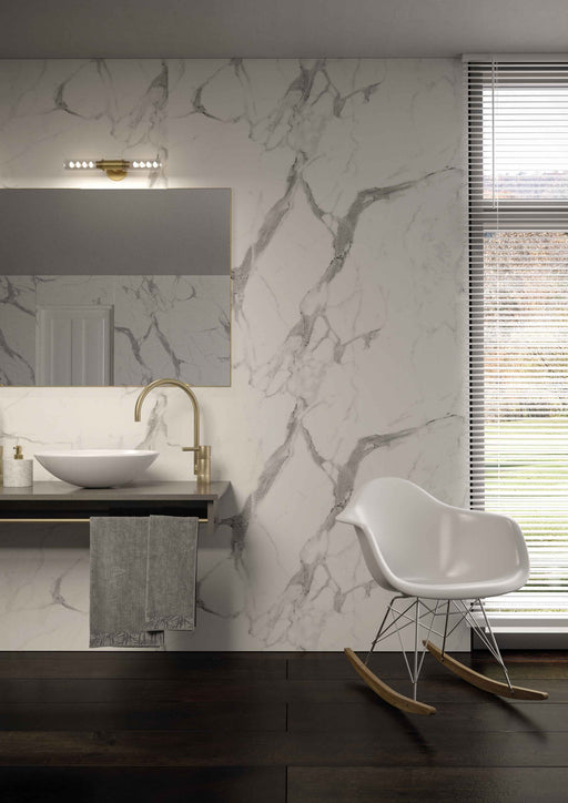 Bushboard Nuance Calacatta Statuario Glaze shower wall panel installed in a bathroom