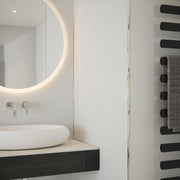 Bushboard Nuance Fusion Ash Grey Gloss fusion wall panel installed in a bathroom