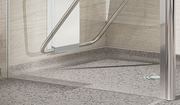 Impey Supreme glass wetroom screen base and pole detail on wetroom floor