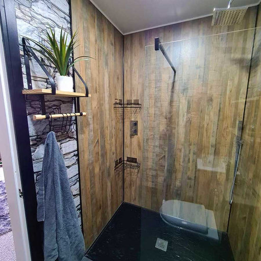 Salvaged Planked Elm Linda Barker Multipanel shower wall panels in a customer bathroom