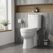 Nuie 860mm comfort height close coupled toilet fitted in a bathroom
