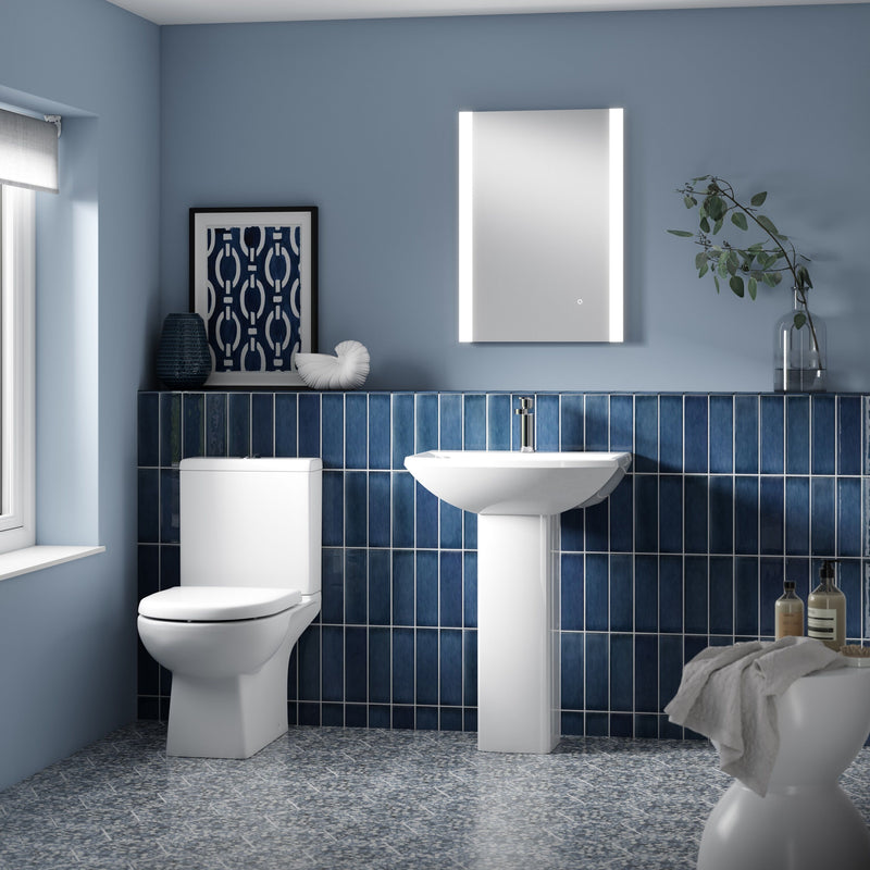 Nuie Asselby 410mm close coupled toilet in a contemporary bathroom
