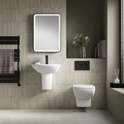 Nuie Cleo rimless wall hung toilet pan in a contemporary bathroom