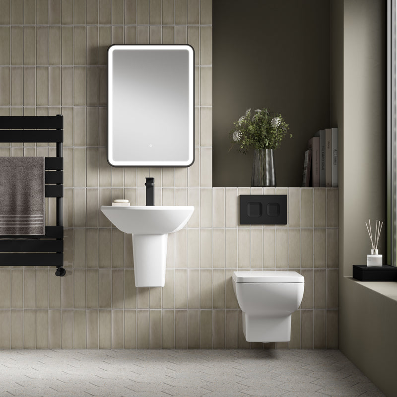 Nuie Cleo rimless wall hung toilet pan in a contemporary bathroom