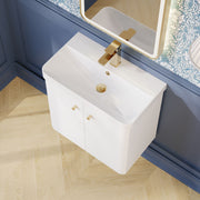 Nuie Core 600mm wall hung vanity unit in Gloss White - bathroom lifestyle setting