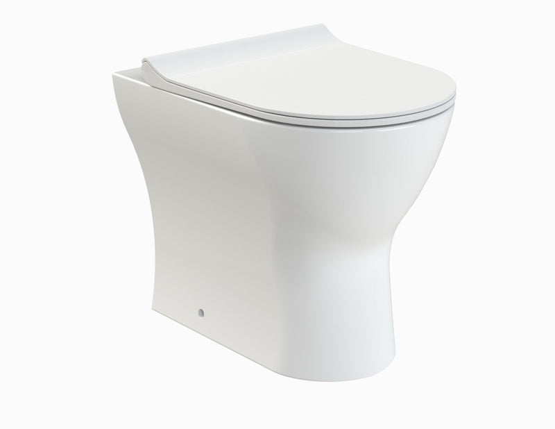 Nuie Freya round back to wall toilet pan with seat in white