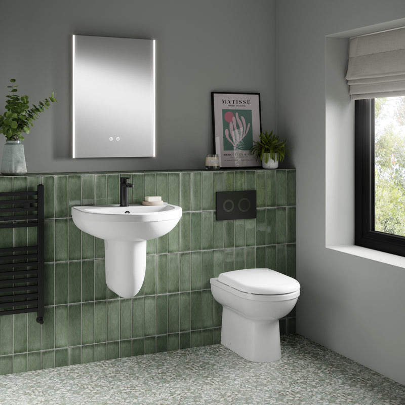 Nuie Ivo round back to wall toilet pan in a contemporary bathroom