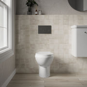 Nuie Melbourne round back to wall toilet pan in a contemporary bathroom
