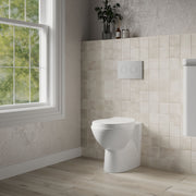 Nuie Melbourne round back to wall toilet pan fitted with furniture