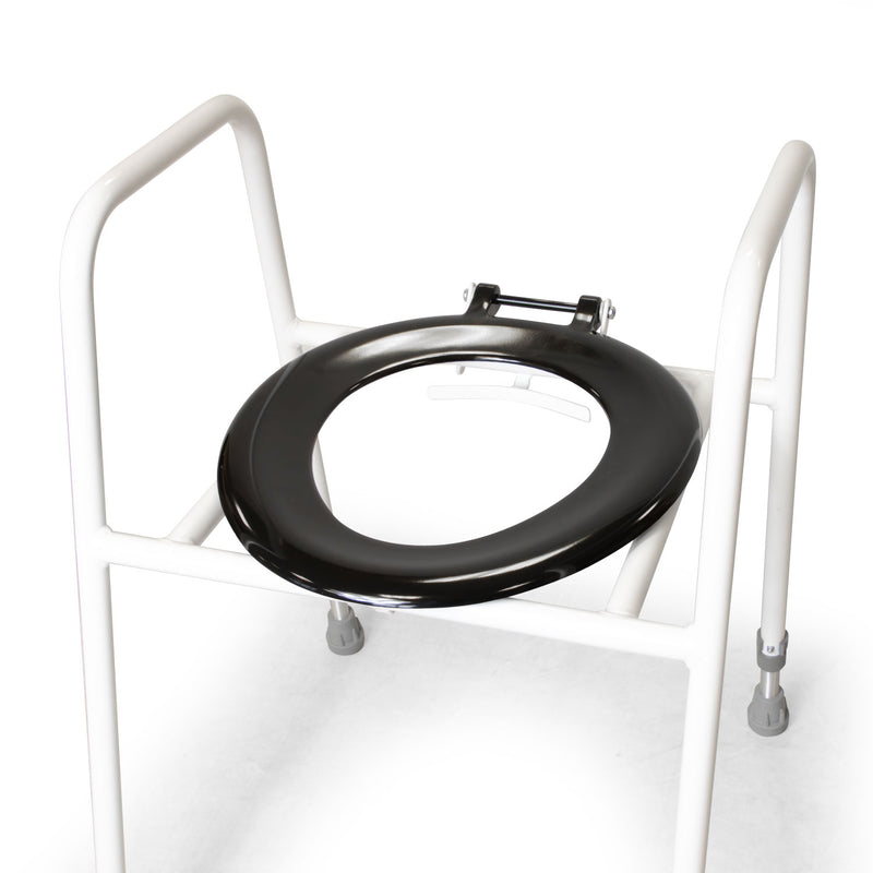 Close-up of the hinged seat and splash guard on the Roma 4306P toilet frame